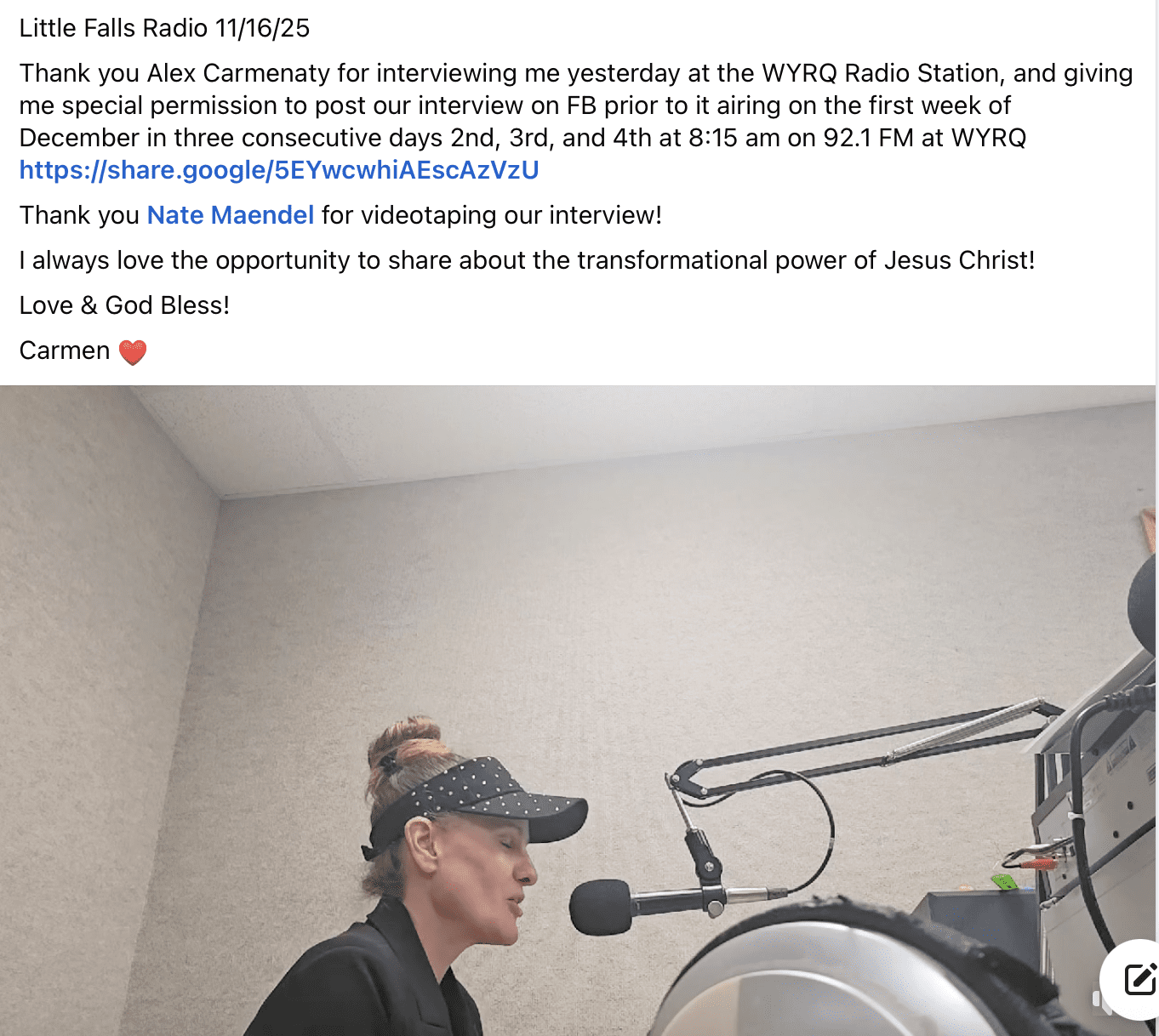 Musician performing live on the WRHG Radio Station broadcast with guitar and microphone.